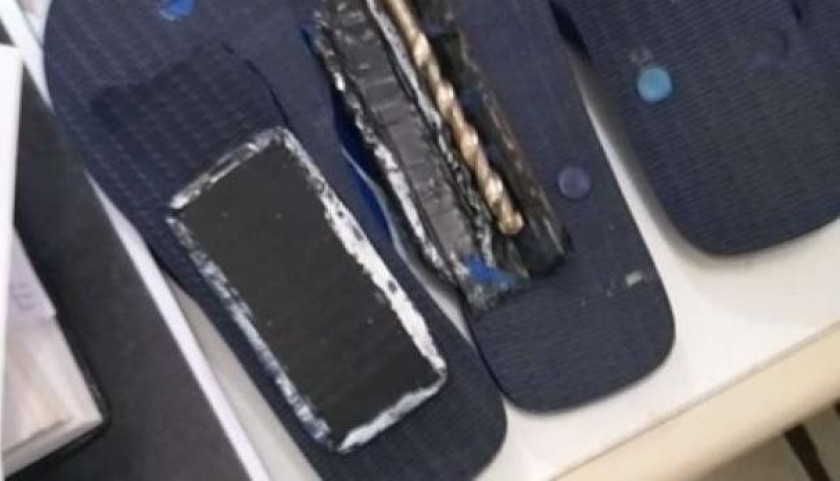 Agentes flagram mulher tentando entrar com celulares na cadeia pública
